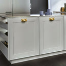 Brushed Brass Gold Claremont Cup Pull Mounted on White Kitchen Island Cabinet