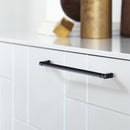 Matte Black Urban Modern Door Handle and Knob Mounted on White Kitchen Cabinet
