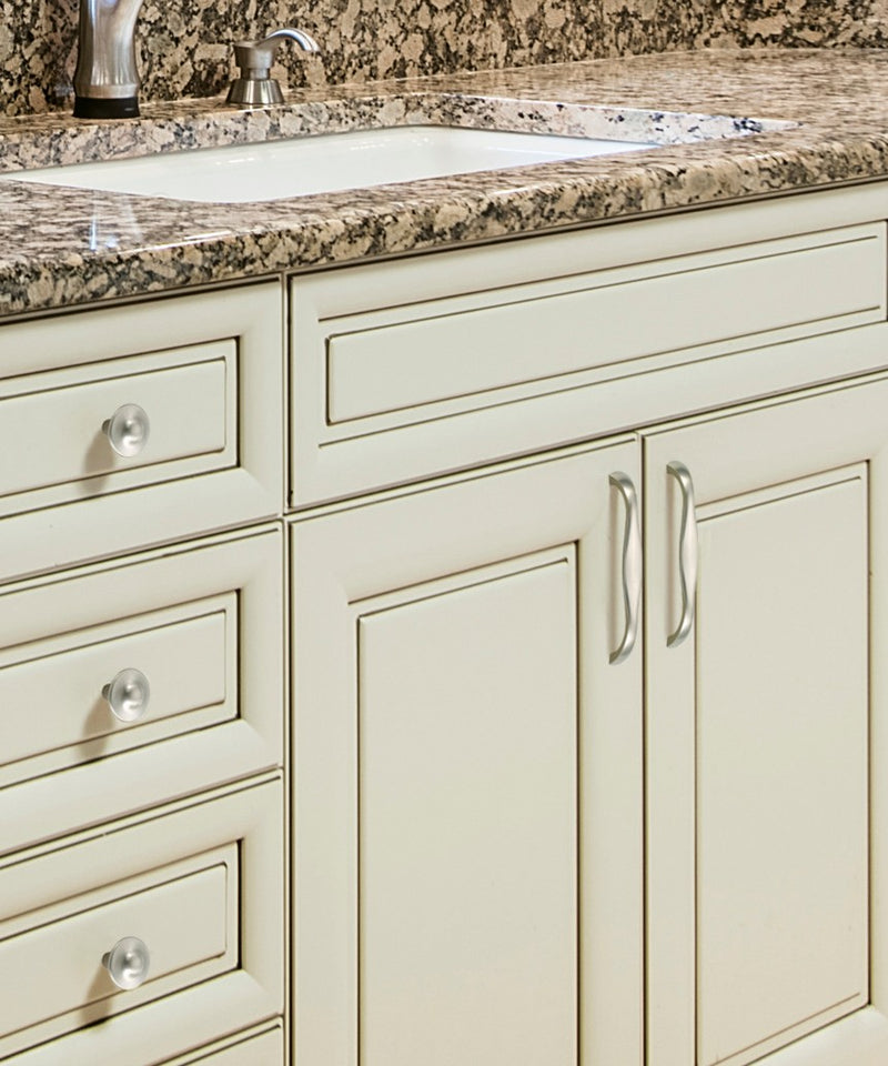 Weston Kitchen Handle in Brushed Nickel Mounted on Cream White Cabinet