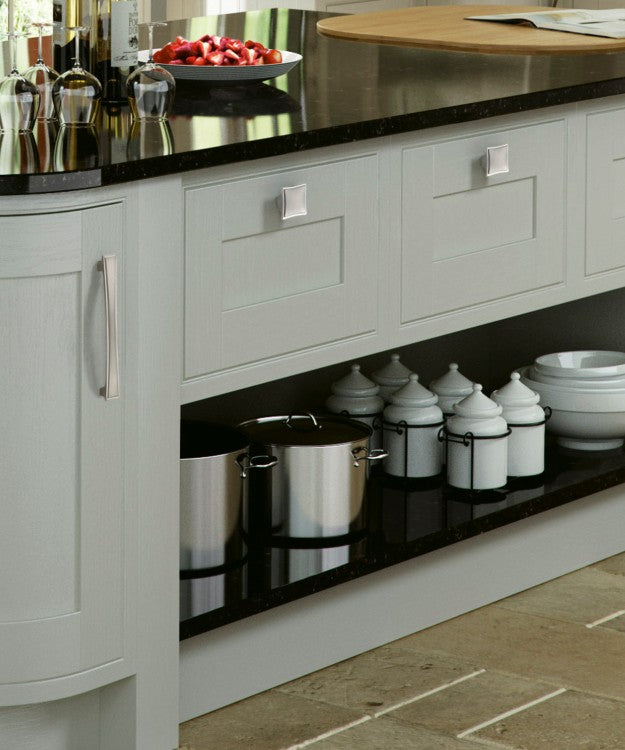 Modern Mitchell 2 Handles and Knobs Mounted on the White Kitchen Cabinet