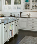 Display of Vintage French Style Lampton Cabinet Handles and Knobs Mounted on the White Cabinet