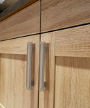 Display of Vintage Cabinet Hardware - Elora 3 Antique Nickel Door Handle on wooden cabinet