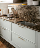 Champagne Scottsdale Hardware Handle Pulls Mounted on White Kitchen Cabinet