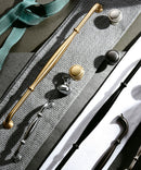 Display of Vintage Rosemont Kitchen Cabinet Handle and Knob